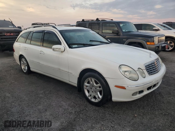2004 Mercedes-Benz E 320 with VIN WDBUH65J64A428426, listed as a Copart auction lot 75079234 with 186,980 mi miles and Salvage Title. Bid and sale history available at DreamBid. Image 4.