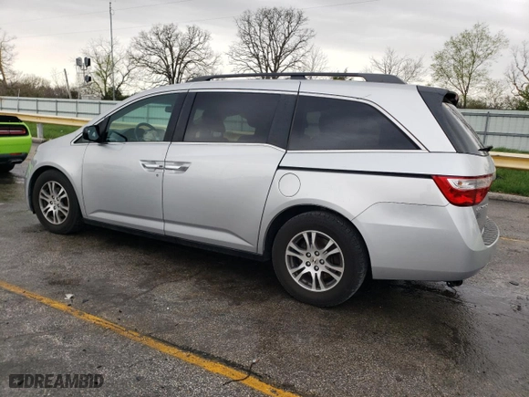 2011 Honda Odyssey EX-L with VIN 5FNRL5H62BB098148, listed as a Copart auction lot 50971955 with 257,103 mi miles and Salvage Title. Bid and sale history available at carsss.com. Image 2.