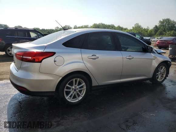 2015 Ford Focus SE with VIN 1FADP3F2XFL321208, listed as a Copart auction lot 61413005 with 139,439 mi miles and Salvage title. Bid and sale history available at DreamBid. Image 3.