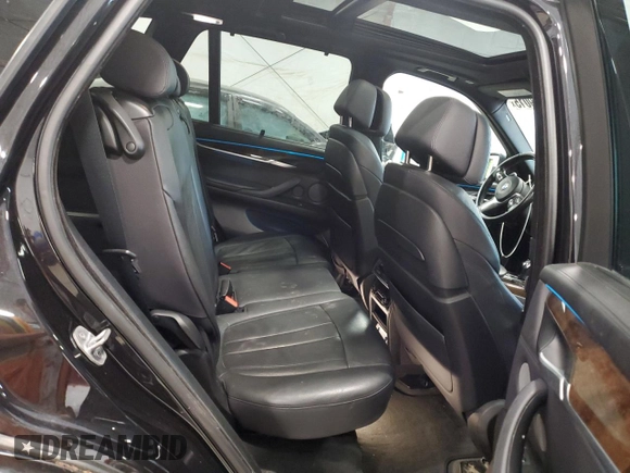 2016 BMW X5 xDrive50i z VIN 5UXKR6C58G0J83648, wystawiony jako Copart lot #58219015 z przebiegiem 96 254 mil mil oraz Szkoda całkowita • Salvage title. Historia ofert i sprzedaży dostępna na DreamBid. Obrazek 11.