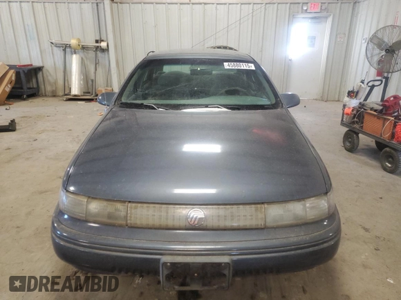 1994 Mercury Sable GS z VIN 1MELM50U0RA631872, wystawiony jako Copart lot #45880115 z przebiegiem 346 803 mil mil oraz Szkody całkowita. Historia ofert i sprzedaży dostępna na DreamBid. Obrazek 5.