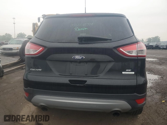 2014 Ford Escape SE z VIN 1FMCU0GX9EUE24499, wystawiony jako Copart lot #59312805 z przebiegiem 88 035 mil mil oraz Czysty tytuł • Clean title. Historia ofert i sprzedaży dostępna na DreamBid. Obrazek 6.