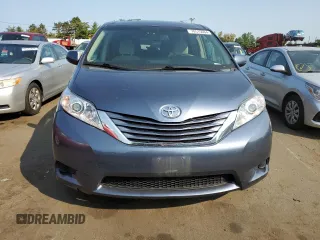 2016 Toyota Sienna LE with VIN 5TDJK3DC2GS133323, listed as a Copart auction lot 70515664 with 106,750 mi miles and Salvage Title. Bid and sale history available at carsss.com. Image 5.