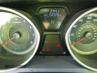 2013 Hyundai Elantra Coupe SE with VIN KMHDH6AE9DU022676, listed as a IAAI auction lot 41816486 with 158,326 mi miles. Bid and sale history available at carsss.com. Image 7.
