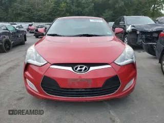 2014 Hyundai Veloster with VIN KMHTC6AD8EU199612, listed as a Copart auction lot 71808324 with 76,130 mi miles and Salvage Title. Bid and sale history available at carsss.com. Image 5.
