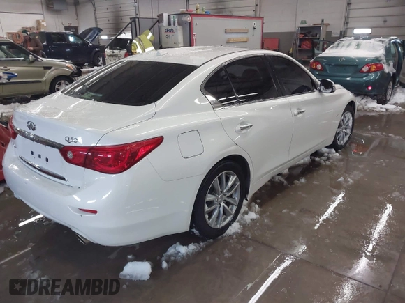 2015 Infiniti Q50 Premium z VIN JN1BV7AR0FM417283, wystawiony jako IAAI lot #41579549 z przebiegiem 112 407 mil mil oraz . Historia ofert i sprzedaży dostępna na DreamBid. Obrazek 4.