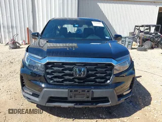 2023 Honda Passport EX-L z VIN 5FNYF8H5XPB013172, wystawiony jako IAAI lot #41680601 z przebiegiem 29 016 mil mil oraz . Historia ofert i sprzedaży dostępna na DreamBid. Obrazek 13.