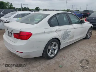 2014 BMW 3 Series 320i xDrive with VIN WBA3C3C52EP661389, listed as a IAAI auction lot 42160042 with 131,997 mi miles and . Bid and sale history available at DreamBid. Image 4.
