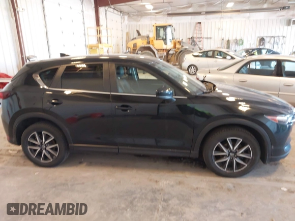 2018 Mazda CX-5 Touring with VIN JM3KFBCM9J0437490, listed as a IAAI auction lot 42006998 with 176,959 mi miles. Bid and sale history available at carsss.com. Image 13.