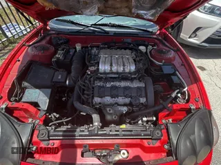 1999 Mitsubishi 3000GT GT z VIN JA3AM84J3XY001387, wystawiony jako Copart lot #61198735 z przebiegiem 137 514 mil mil oraz Czysty tytuł • Clean title. Historia ofert i sprzedaży dostępna na DreamBid. Obrazek 7.