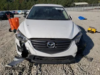 2016 Mazda CX-5 Touring with VIN JM3KE2CY6G0896040, listed as a Copart auction lot 78399684 with 98,639 mi miles and Salvage Title. Bid and sale history available at DreamBid. Image 5.