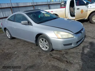 2004 Honda Accord Cpe EX with VIN 1HGCM82664A010907, listed as a IAAI auction lot 42086599 with 215,595 mi miles. Bid and sale history available at carsss.com. Image 1.