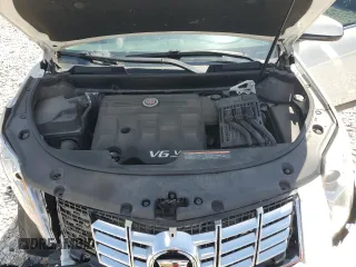 2016 Cadillac SRX Luxury Collection z VIN 3GYFNBE34GS505188, wystawiony jako Copart lot #56690805 z przebiegiem 121 935 mil mil oraz Czysty tytuł • Clean title. Historia ofert i sprzedaży dostępna na DreamBid. Obrazek 12.