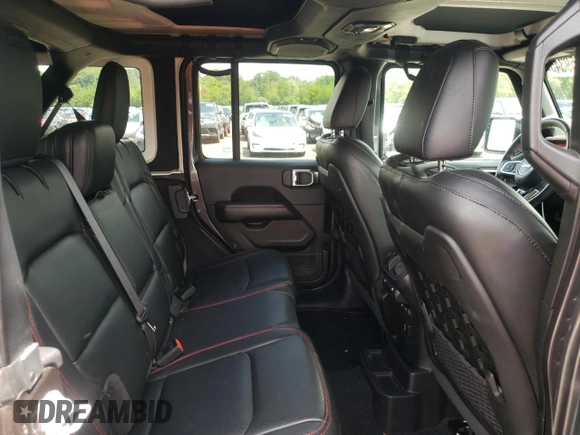 2018 Jeep Wrangler Unlimited Rubicon with VIN 1C4HJXFG1JW261472, listed as a Copart auction lot 63259345 with 60,457 mi miles and Salvage title. Bid and sale history available at DreamBid. Image 10.