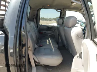 2003 Ford F-150 XLT with VIN 1FTRW07L43KB05221, listed as a IAAI auction lot 41762332 with 226,660 mi miles. Bid and sale history available at carsss.com. Image 8.