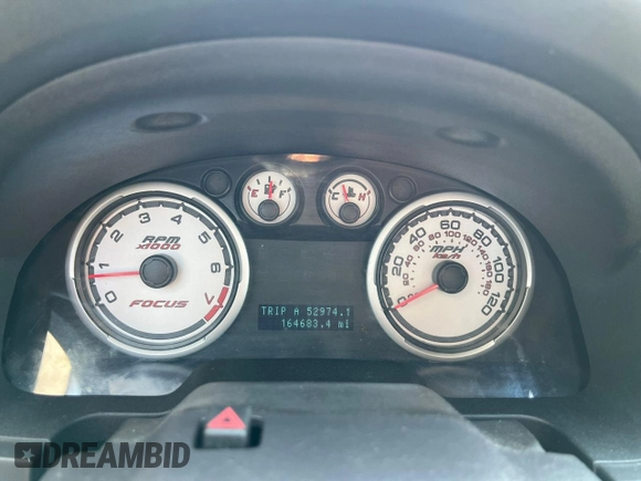 2008 Ford Focus SE with VIN 1FAHP35N28W24058, listed as a Copart auction lot 66020775 with 164,683 mi miles and Clean title. Bid and sale history available at DreamBid. Image 8.