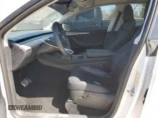 2022 Tesla Model Y Long Range with VIN 7SAYGDEE7NA012634, listed as a Copart auction lot 49206295 with 19,267 mi miles and Clean Title. Bid and sale history available at DreamBid. Image 7.