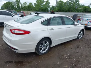 2016 Ford Fusion Titanium with VIN 3FA6P0SU5GR287017, listed as a IAAI auction lot 42316622 with 97,000 mi miles and . Bid and sale history available at DreamBid. Image 4.