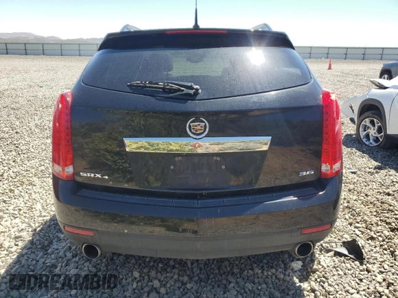 2013 Cadillac SRX Performance Collection z VIN 3GYFNHE37DS519391, wystawiony jako Copart lot #56307695 z przebiegiem 122 294 mil mil oraz Czysty tytuł • Clean title. Historia ofert i sprzedaży dostępna na DreamBid. Obrazek 6.