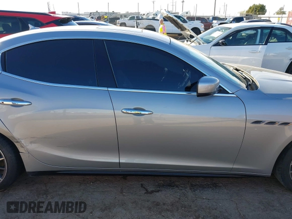 2015 Maserati Ghibli z VIN ZAM57XSA7F1135961, wystawiony jako IAAI lot #40831583 z przebiegiem 89 671 mil mil oraz . Historia ofert i sprzedaży dostępna na DreamBid. Obrazek 13.