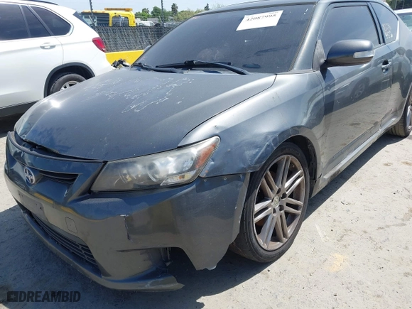 2011 Scion tC with VIN JTKJF5C72B3015652, listed as a IAAI auction lot 42087995 with 175,768 mi miles. Bid and sale history available at carsss.com. Image 6.
