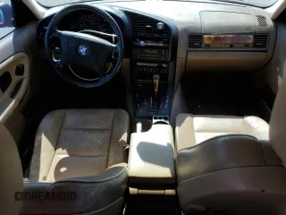 1997 BMW 3 Series 328iA with VIN WBACD4325VAV44675, listed as a Copart auction lot 72289164 with 151,999 mi miles and Salvage Title. Bid and sale history available at carsss.com. Image 8.