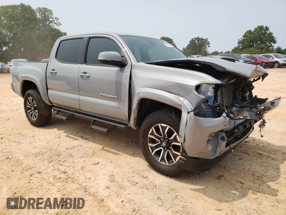 2021 Toyota Tacoma SR5 z VIN 5TFAZ5CN2MX099562, wystawiony jako Copart lot #59329335 z przebiegiem 23 570 mil mil oraz Czysty tytuł • Clean title. Historia ofert i sprzedaży dostępna na DreamBid. Obrazek 4.