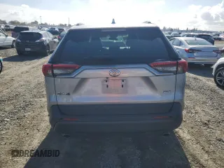 2019 Toyota RAV4 XLE with VIN 2T3W1RFV0KW036705, listed as a Copart auction lot 80983694 with 110,823 mi miles and Salvage Title. Bid and sale history available at carsss.com. Image 6.
