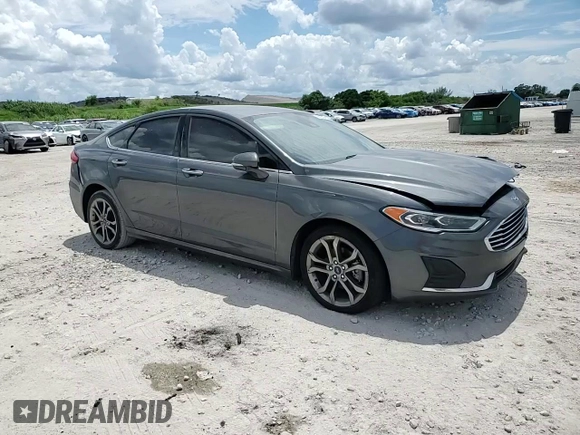 2020 Ford Fusion SEL with VIN 3FA6P0CD5LR177156, listed as a Copart auction lot 65674585 with 123,728 mi miles and Salvage title. Bid and sale history available at DreamBid. Image 13.