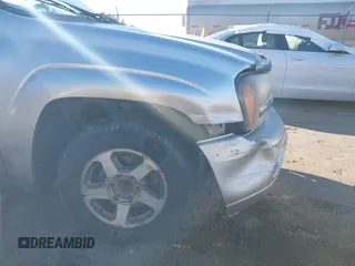 2006 Chevrolet TrailBlazer LS with VIN 1GNDS13S862265008, listed as a IAAI auction lot 41263151 with 254,504 mi miles and . Bid and sale history available at DreamBid. Image 13.