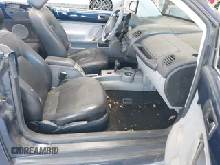 2003 Volkswagen Beetle GLS with VIN 3VWCK21Y13M303732, listed as a IAAI auction lot 42509742 with 144,545 mi miles and . Bid and sale history available at DreamBid. Image 5.