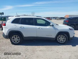 2016 Jeep Cherokee Latitude z VIN 1C4PJLCS0GW138381, wystawiony jako IAAI lot #41844589 z przebiegiem 100 991 mil mil oraz . Historia ofert i sprzedaży dostępna na DreamBid. Obrazek 13.