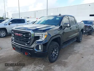 2021 GMC Sierra 1500 AT4 z VIN 1GTP9EELXMZ304412, wystawiony jako IAAI lot #41069878 z przebiegiem 48 987 mil mil oraz . Historia ofert i sprzedaży dostępna na DreamBid. Obrazek 2.