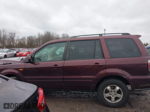 2007 Honda Pilot EX-L with VIN 2HKYF18557H535426, listed as a IAAI auction lot 41126160 with 169,336 mi miles. Bid and sale history available at carsss.com. Image 14.