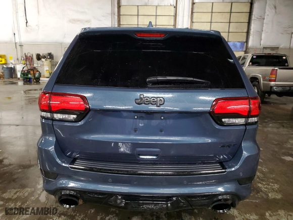 2021 Jeep Grand Cherokee SRT with VIN 1C4RJFDJ2MC606186, listed as a Copart auction lot 79479704 with 39,349 mi miles and Salvage Title. Bid and sale history available at carsss.com. Image 6.