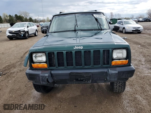 2000 Jeep Cherokee with VIN 1J4FF48S3YL149593, listed as a Copart auction lot 52489045 with 290,231 mi miles and Salvage title. Bid and sale history available at DreamBid. Image 5.