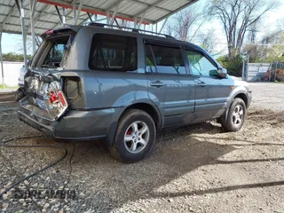 2007 Honda Pilot EX-L with VIN 5FNYF18777B012649, listed as a IAAI auction lot 42070873 with 167,419 mi miles and . Bid and sale history available at DreamBid. Image 4.