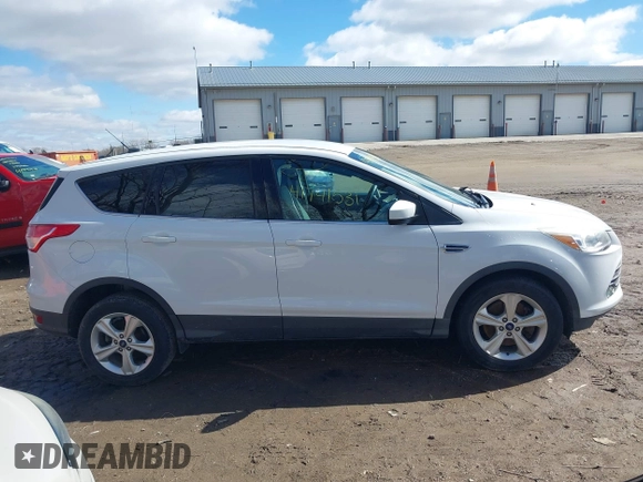 2015 Ford Escape SE with VIN 1FMCU9GX5FUB15747, listed as a IAAI auction lot 41741531 with 95,027 mi miles. Bid and sale history available at carsss.com. Image 13.