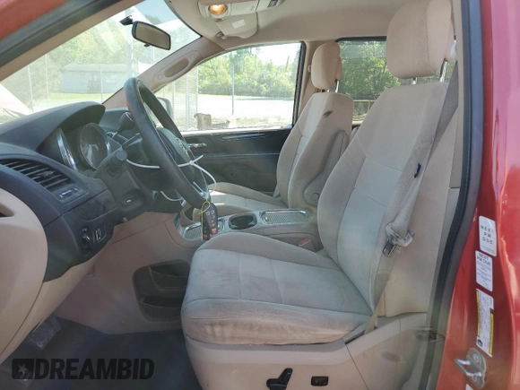 2014 Dodge Grand Caravan SXT with VIN 2C4RDGCG5ER182160, listed as a Copart auction lot 54140505 with 61,576 mi miles and Salvage Title. Bid and sale history available at DreamBid. Image 7.