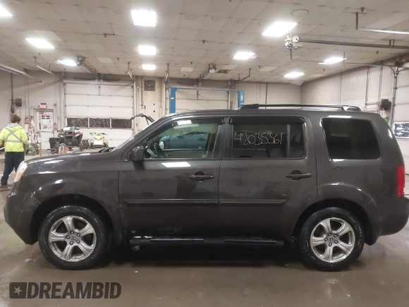 2012 Honda Pilot EX-L z VIN 5FNYF4H51CB047259, wystawiony jako IAAI lot #42035361 z przebiegiem 122 488 mil mil oraz . Historia ofert i sprzedaży dostępna na DreamBid. Obrazek 13.