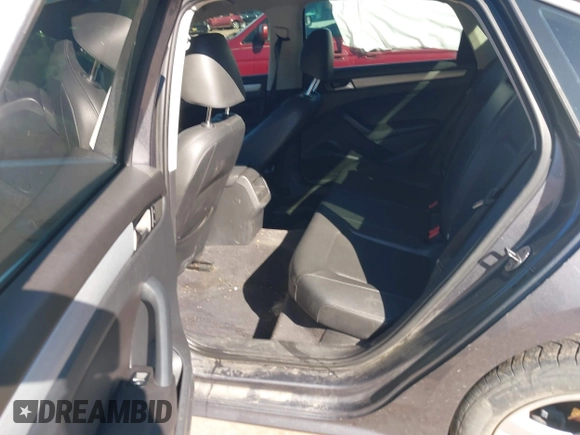 2012 Volkswagen Passat SE with VIN 1VWBH7A36CC027321, listed as a IAAI auction lot 41596709 with 173,357 mi miles and . Bid and sale history available at DreamBid. Image 8.