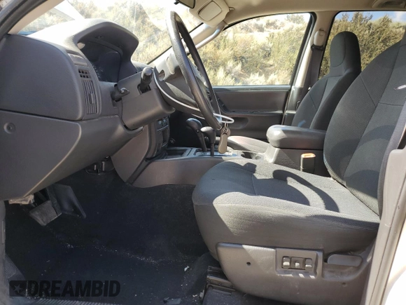 2003 Jeep Grand Cherokee Laredo with VIN 1J4GW48S83C517330, listed as a Copart auction lot 52765415 with 108,920 mi miles and Salvage title. Bid and sale history available at DreamBid. Image 7.
