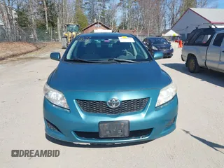 2009 Toyota Corolla with VIN JTDBL40E299037014, listed as a IAAI auction lot 42078954 with 86,559 mi miles. Bid and sale history available at carsss.com. Image 13.