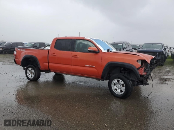 2017 Toyota Tacoma SR5 with VIN 3TMDZ5BN7HM025726, listed as a Copart auction lot 47418515 with 130,436 mi miles and Salvage Title. Bid and sale history available at carsss.com. Image 4.