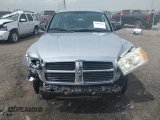 2007 Dodge Dakota SLT with VIN 1D7HE48KX7S122712, listed as a IAAI auction lot 41888864 with 114,384 mi miles and . Bid and sale history available at carsss.com. Image 6.