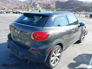 2013 MINI Cooper Paceman S with VIN WMWSS5C56DWN49161, listed as a IAAI auction lot 41450692 with 87,969 mi miles. Bid and sale history available at carsss.com. Image 4.