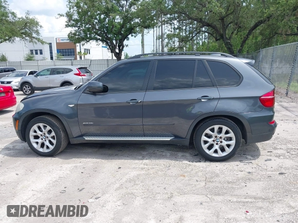 2012 BMW X5 35i z VIN 5UXZV4C5XCL990728, wystawiony jako IAAI lot #42386095 z przebiegiem 124 613 mil mil oraz . Historia ofert i sprzedaży dostępna na DreamBid. Obrazek 14.