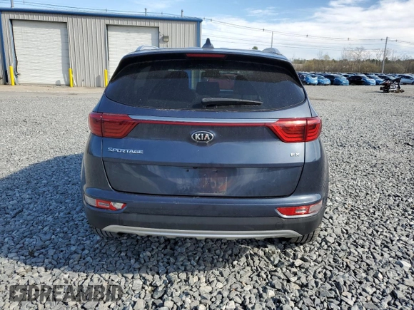 2019 Kia Sportage EX z VIN KNDPNCAC9K7533792, wystawiony jako Copart lot #53251705 z przebiegiem 36 885 mil mil oraz Szkoda całkowita • Salvage title. Historia ofert i sprzedaży dostępna na DreamBid. Obrazek 6.
