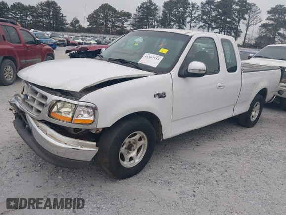 1999 Ford F-150 with VIN 1FTZX1728XNA81813, listed as a IAAI auction lot 41367154 with 149,103 mi miles and . Bid and sale history available at DreamBid. Image 2.