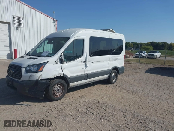 2017 Ford Transit Passenger XL z VIN 1FMZK1CM9HKA28283, wystawiony jako IAAI lot #39970695 z przebiegiem 151 916 mil mil oraz . Historia ofert i sprzedaży dostępna na DreamBid. Obrazek 16.
